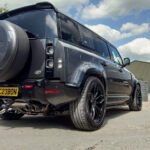 land_rover_defender_l663_90_110_gloss_black_front_rear_corners.jpg
