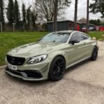 MERCEDES_W205_C63_C63S_FRONT_BUMPER_CARBON_FIBRE_CANARDS_FINS_EDITED.jpg