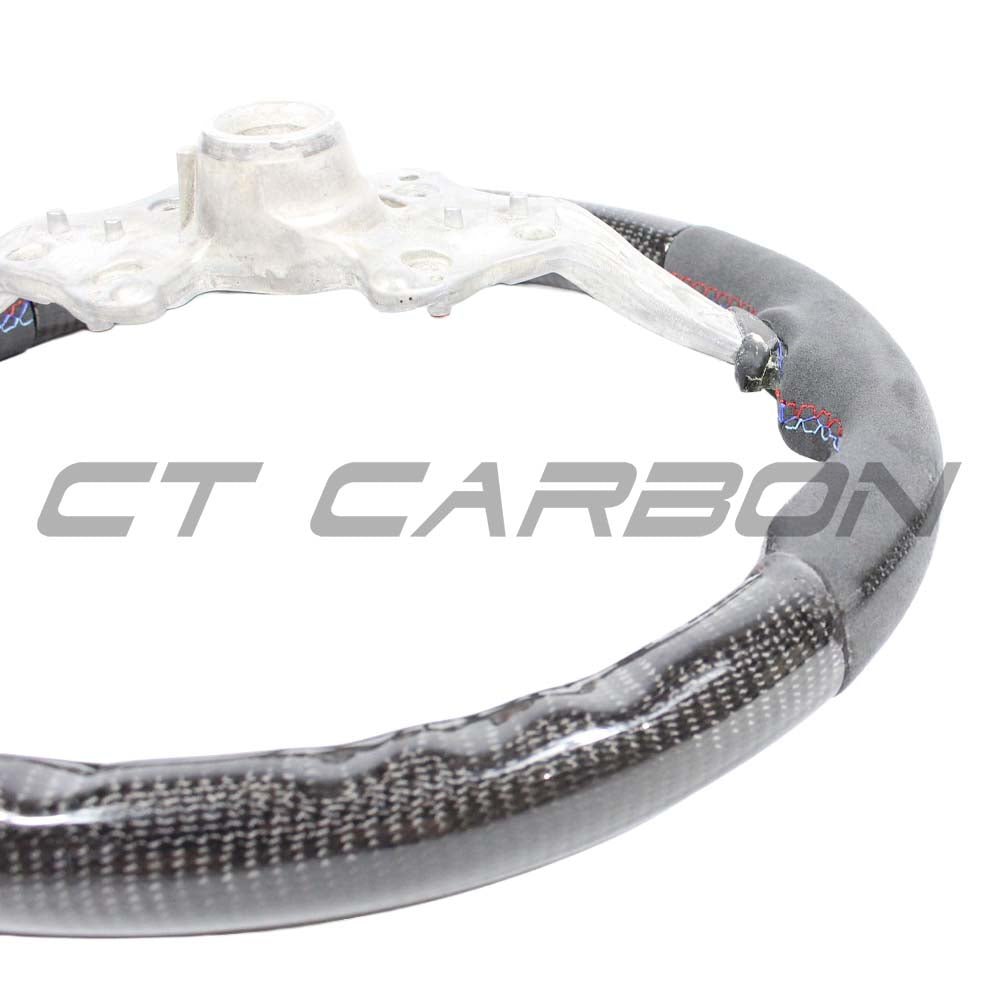 ct-carbon-steering-wheel-bmw-fxx-carbon-fibre-alcantara-steering-wheel-ct-carbon-bmw-fxx-carbon-fibre-alcantara-steering-wheel-28558173798570_a0453406-1ddb-46d6-a0d2-4388f76388fb.jpg